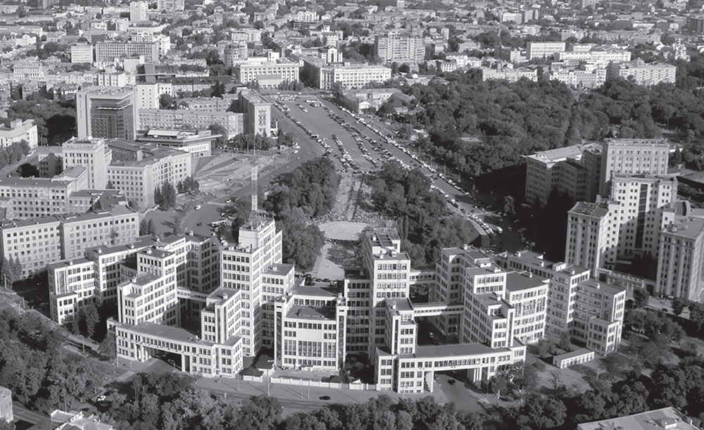 Freedom Square (the former Dzerzhinsky Square) in Kharkiv. In the foreground (from left to right): North building of Karazin University (former House of Cooperation), Derzhprom, Karazin University (former House of Projects), at the far end of the square - the building of the Kharkiv Regional Administration, on the left at the bend of the square - the Kharkiv Hotel building (former International). © Air Production, 2021.